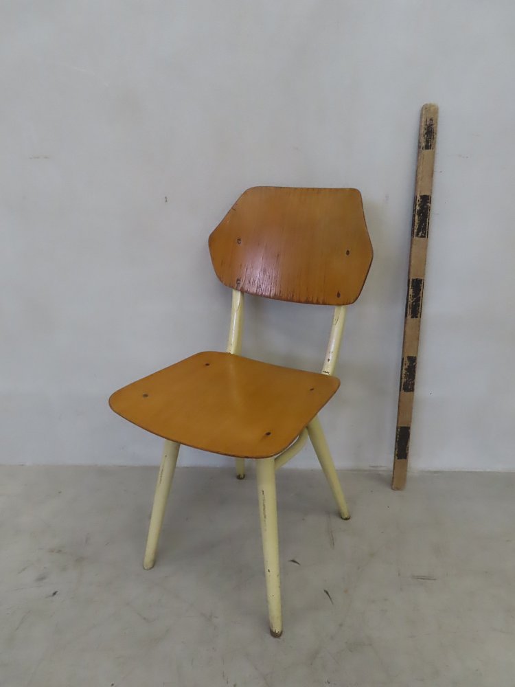 Chair with metal construction