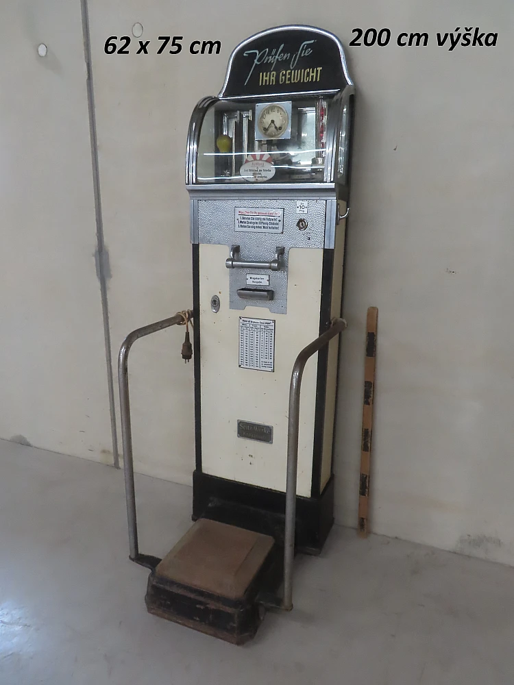 Scales - old coin weighing machine