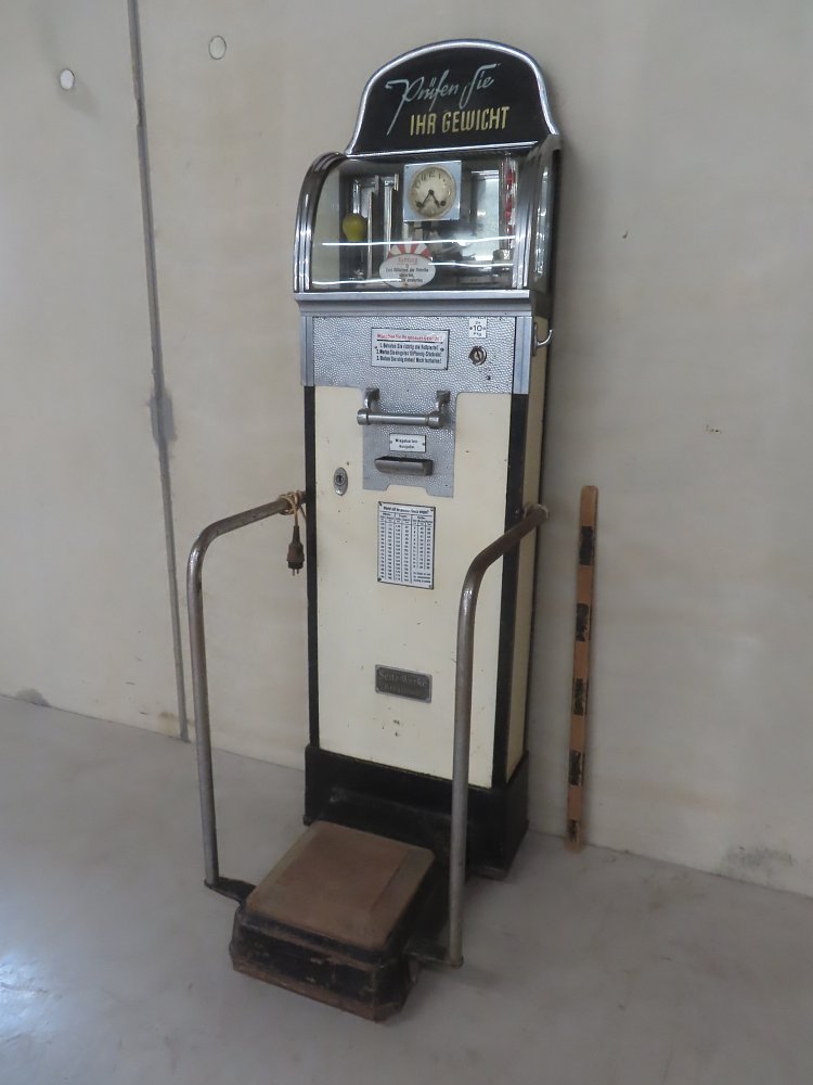 Scales - old coin weighing machine