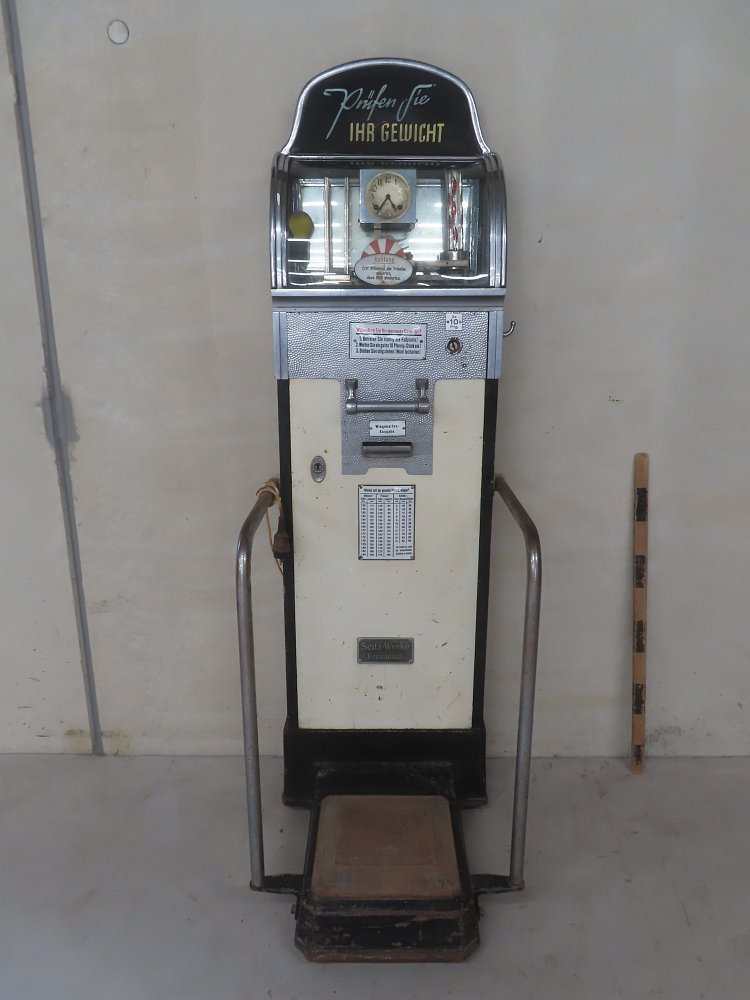 Scales - old coin weighing machine